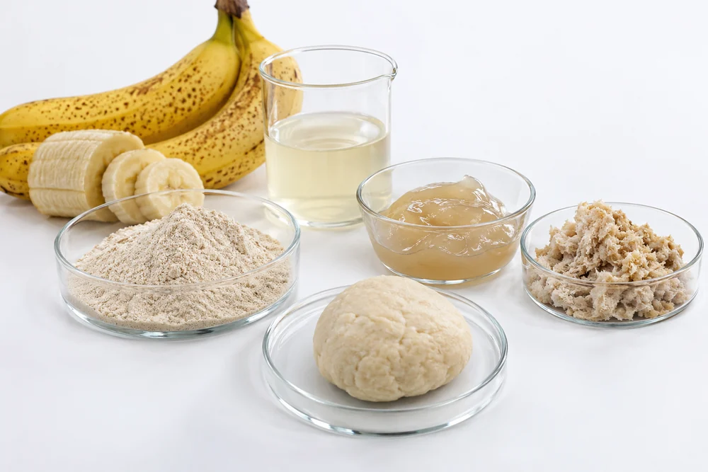 Banana flour, liquid and gel-like fractions beside a starch dough sample